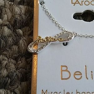NWT Crystal and gold Believe necklace